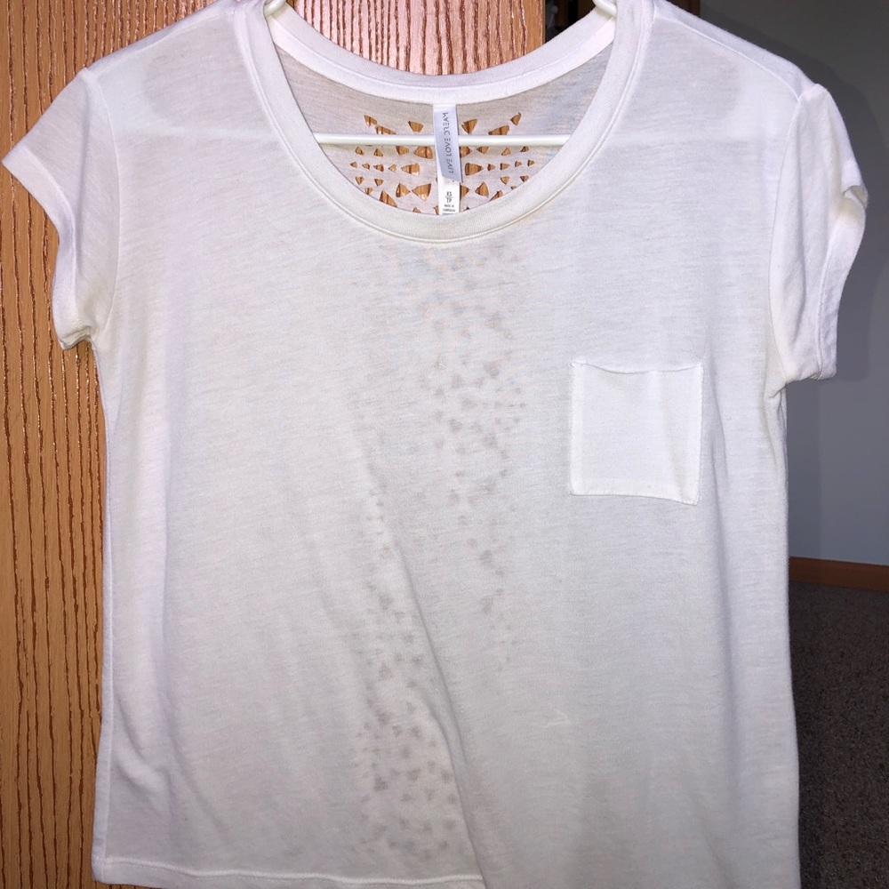 Women’s white tee with cut out design on back